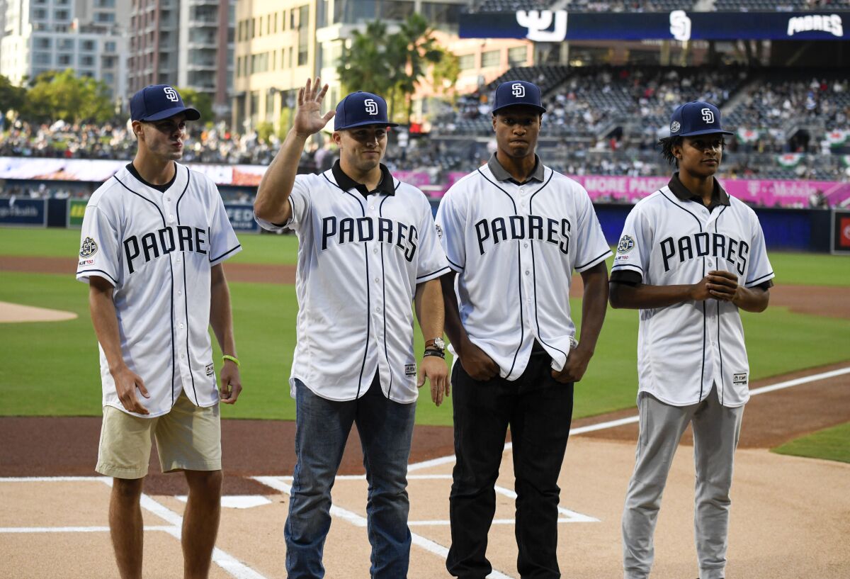 SAN DIEGO, CA - JUNE 8: San Diego Padres draft picks, from left, Matt Brash, Logan Driscoll, Joshua Mears and C.J Abrams, stand at home plate before a baseball game between the San Diego Padres and the Washington Nationals at Petco Park June 8, 2019 in San Diego, California. (Photo by Denis Poroy/Getty Images) ** OUTS - ELSENT, FPG, CM - OUTS * NM, PH, VA if sourced by CT, LA or MoD **