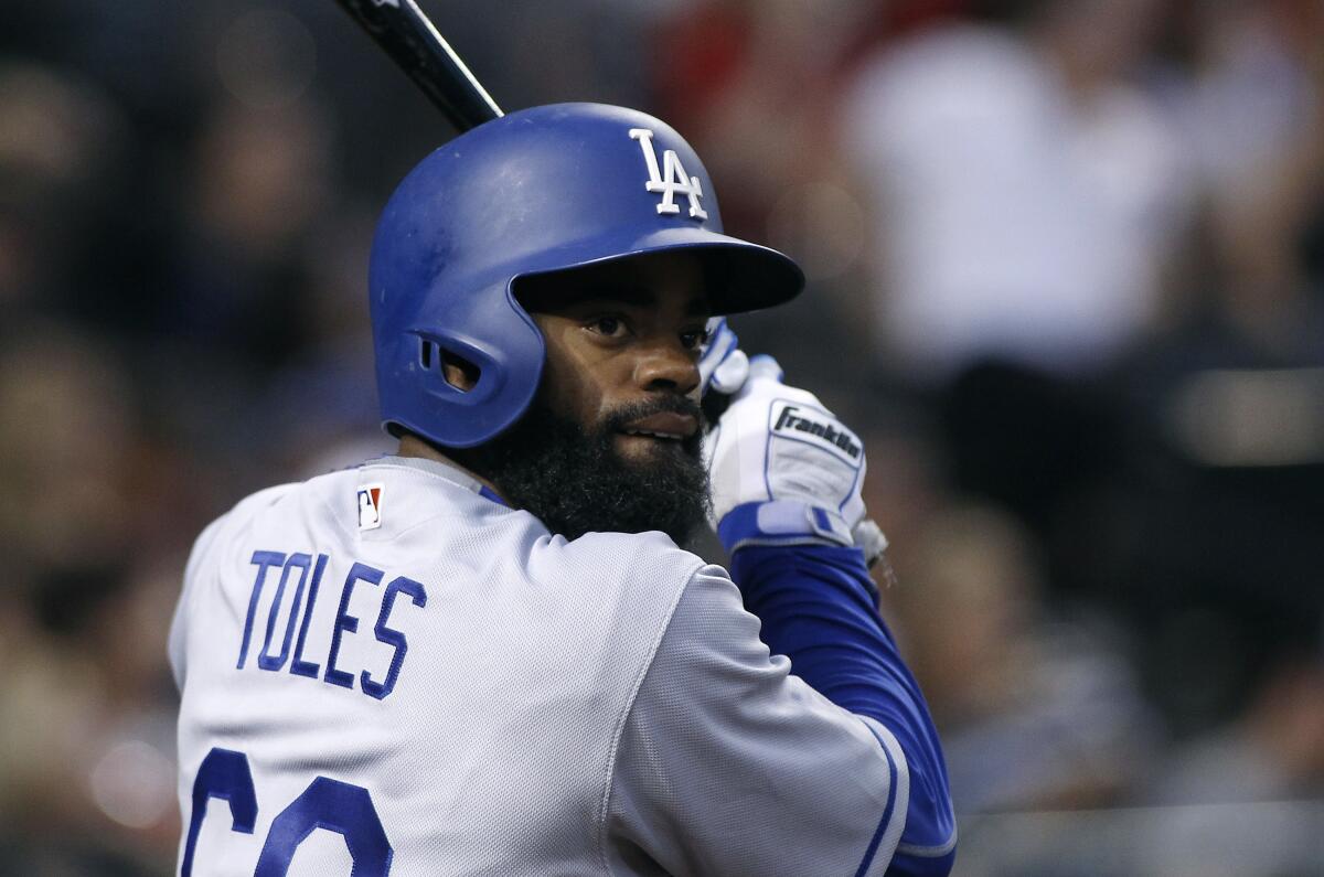 Dodgers renew Andrew Toles' contract, help him keep health insurance - Los Angeles Times