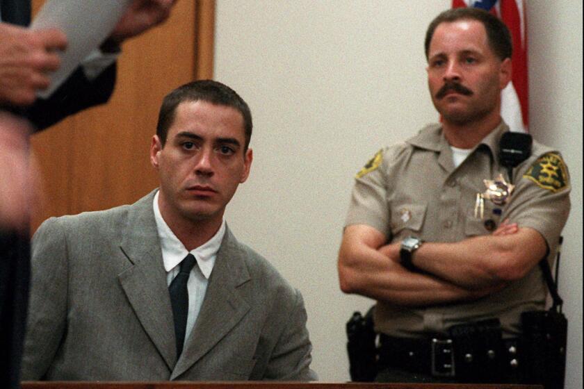 Robert Downey Jr. appears in a Malibu courtroom on July 25, 1996, after his third arrest in a month.