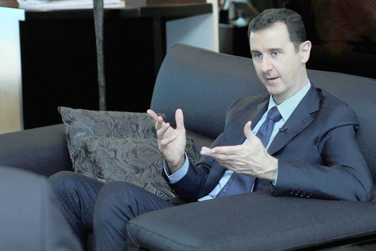 Syrian President Bashar Assad speaks during an interview with a Russian newspaper in Damascus on Monday.