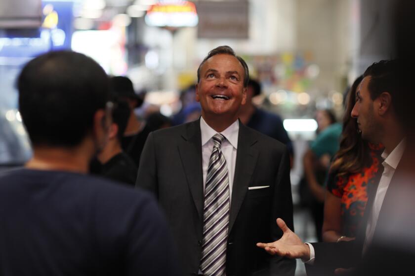 Los Angeles, CA, Thursday, June 2, 2022 - Rick Caruso tours Grand Central Market as he continues his campaign to become Mayor of LA. (Robert Gauthier/Los Angeles Times)