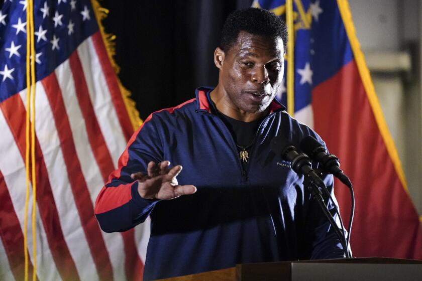 Republican nominee for U.S Senate Herschel Walker speaks during a campaign rally Thursday, Nov. 10, 2022 in Canton, Ga.. Walker is in a runoff with incumbent Democrat Raphael Warnock. (AP Photo/John Bazemore)