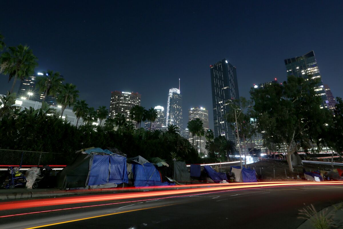 A homeless encampment lines James M. Wood Street in downtown L.A. on Dec. 30.