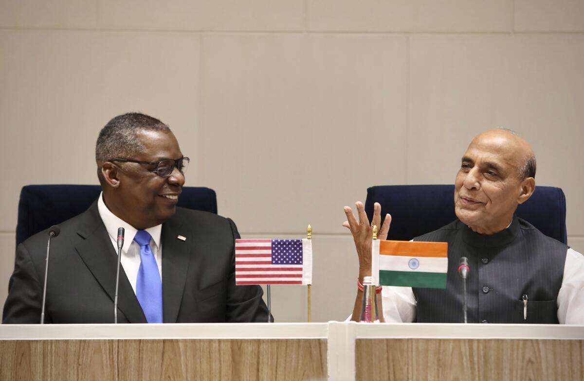 U.S. Secretary of Defense Lloyd Austin and Indian Defense Minister Rajnath Singh address the media in New Delhi on Saturday.