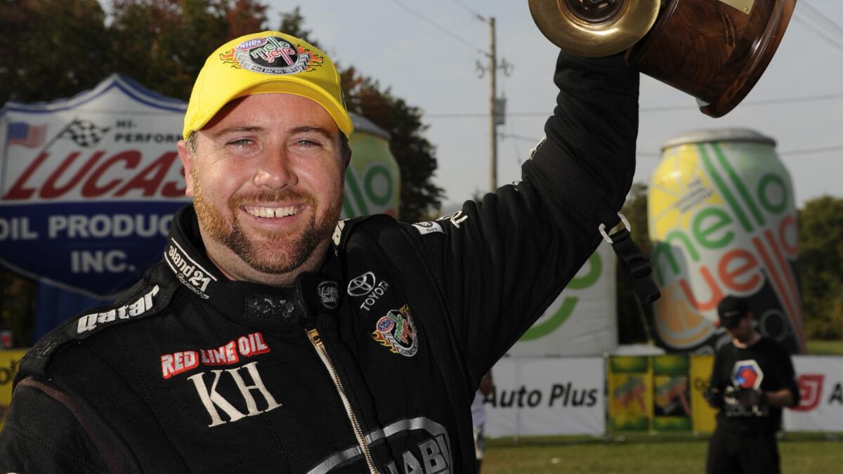 Drag racer Shawn Langdon celebrates his first career win at Maple Grove Raceway in Pennsylvania in 2013.