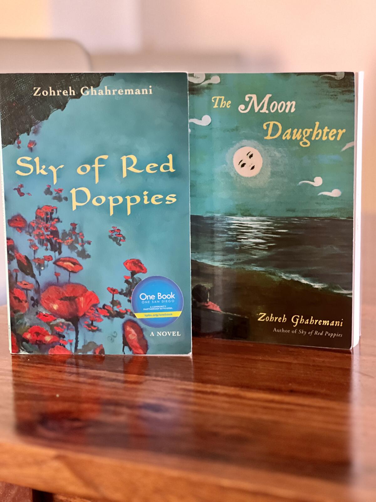 Pictured are Zoe Ghahremani's first two books. She has four others about to be published.