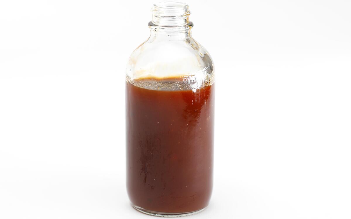 Fresh chiles, warm spices and honey flavor this tangy-tart barbecue sauce.