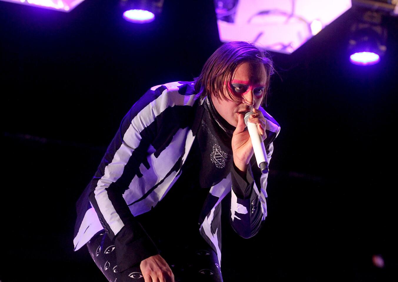 Arcade Fire lead vocalist Win Butler performs on the main stage on the third night of the Coachella Valley Music and Arts Festival in Indio.