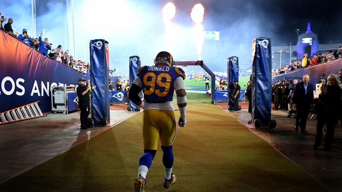 Rams Aaron Donald is introduced before a game against the Eagles at the Coliseum on Dec. 17, 2018.