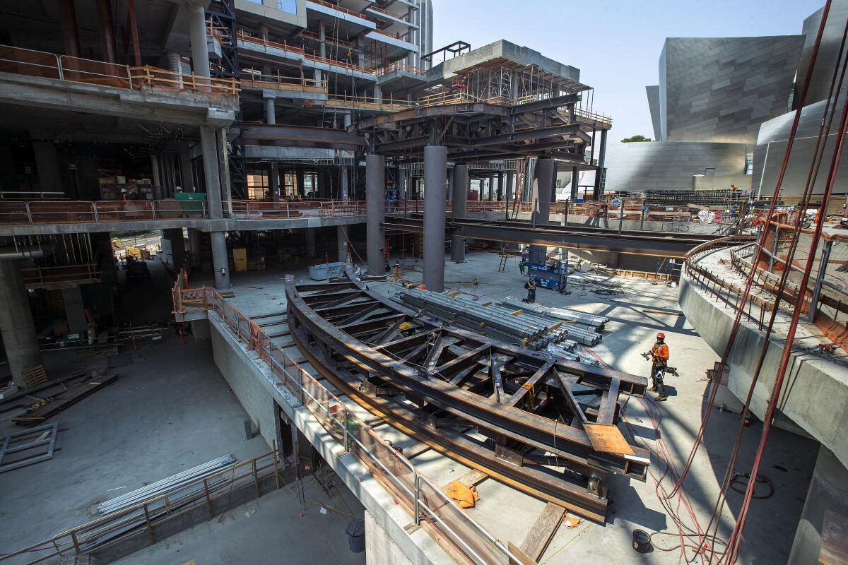 Crews work on the Grand's central plaza.