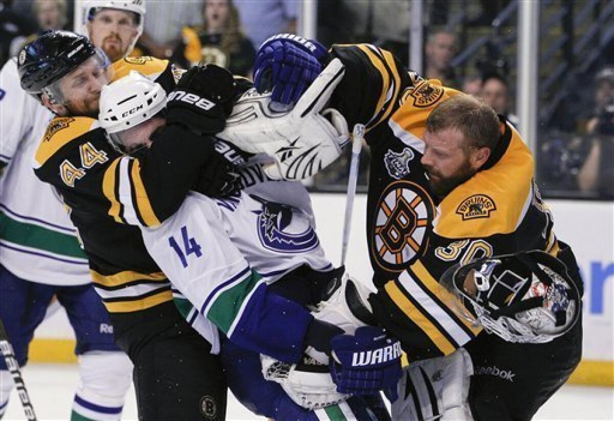 Bruins score early, Tim Thomas shuts out Lightning to give Boston