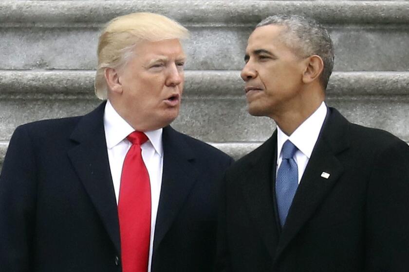 FILE - In this Friday, Jan. 20, 2017, file photo, President Donald Trump talks with former President Barack Obama on Capitol Hill in Washington, prior to Obama's departure to Andrews Air Force Base, Md. Trump relentlessly congratulates himself for the healthy state of the U.S. economy. But in the year since Trumpâs inauguration, most analysts tend to agree on this: The economy remains essentially the same sturdy one he inherited from Obama. (Rob Carr/Pool Photo via AP, File)