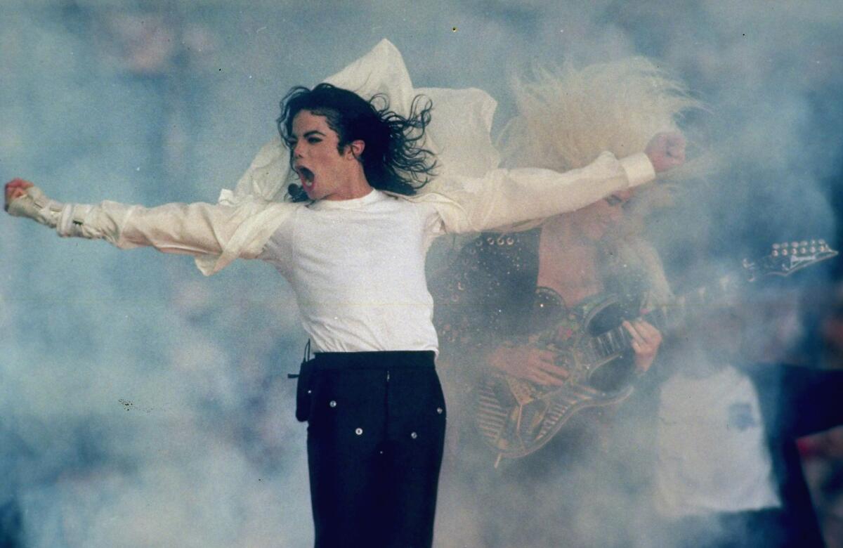 Michael Jackson performs during the halftime show at Super Bowl XXVII in Pasadena on Jan. 31, 1993.