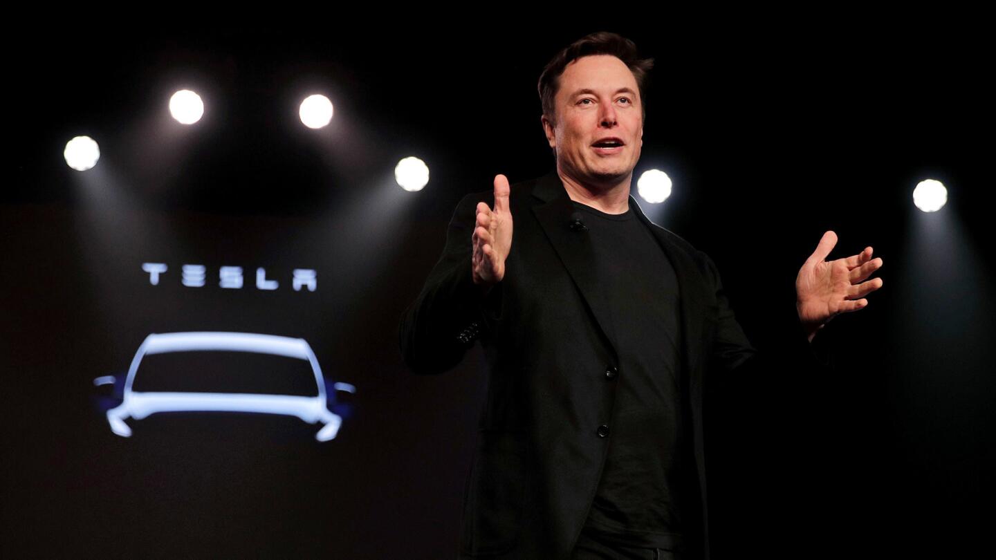 Tesla CEO Elon Musk speaks before unveiling the Model Y at Tesla's Design Studio in Hawthorne, Calif. on Mar. 14, 2019.