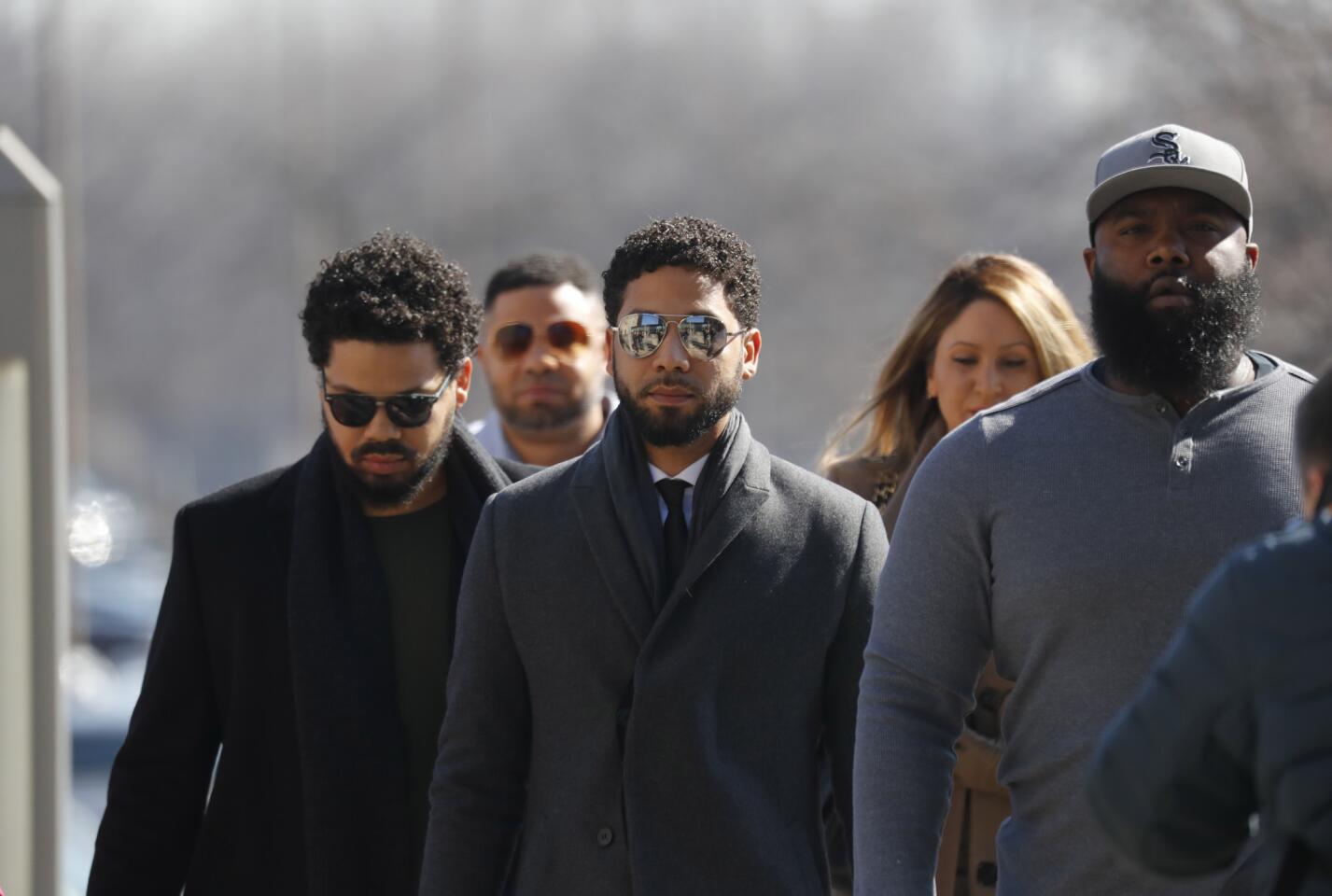 Jussie Smollett enters the Leighton Criminal Court Building, March 12, 2019, for a hearing on whether cameras will be allowed in the courtroom on the criminal charges he faces.