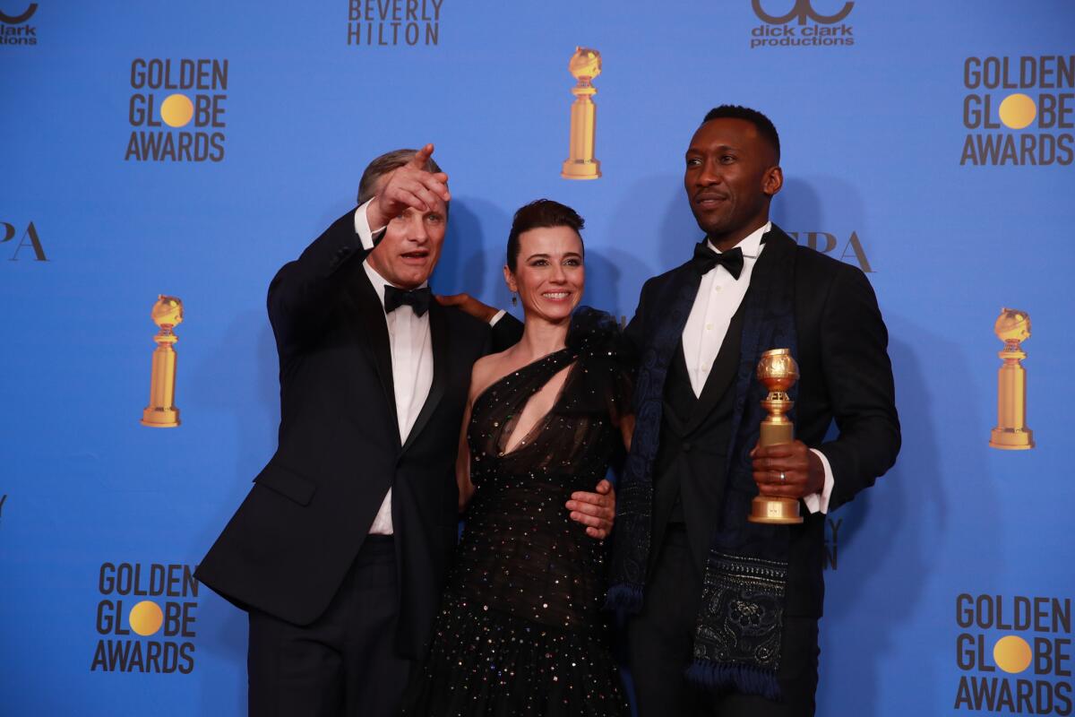 Viggo Mortensen, Linda Cardellini and Mahershala Ali backstage at the Golden Globes.