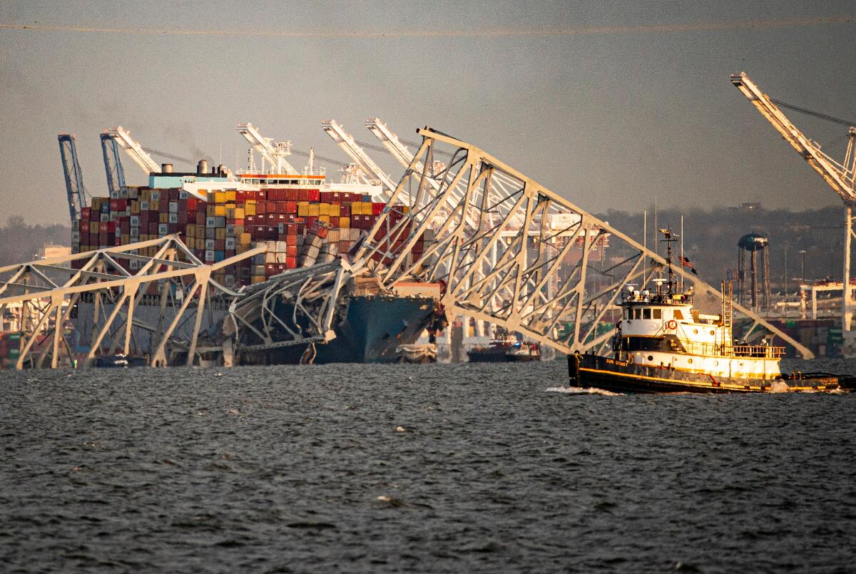 A container ship sits idle after striking the Francis Scott Key Bridge.