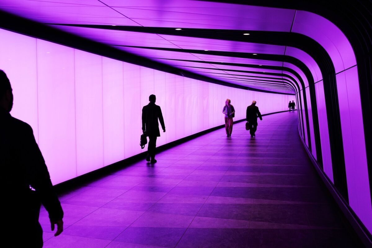 Pedestrians walk through a London Underground station in May. On a round-trip voyage, it often seems like the journey home goes faster than the outbound leg. Using movies of walking trips, scientists in Japan made an effort to figure out why that is.