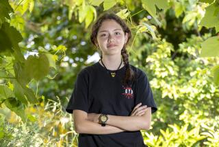 Sophia Perez a seventh-grader at Mark Twain Middle School stands for a portrait in Los Angeles, CA.