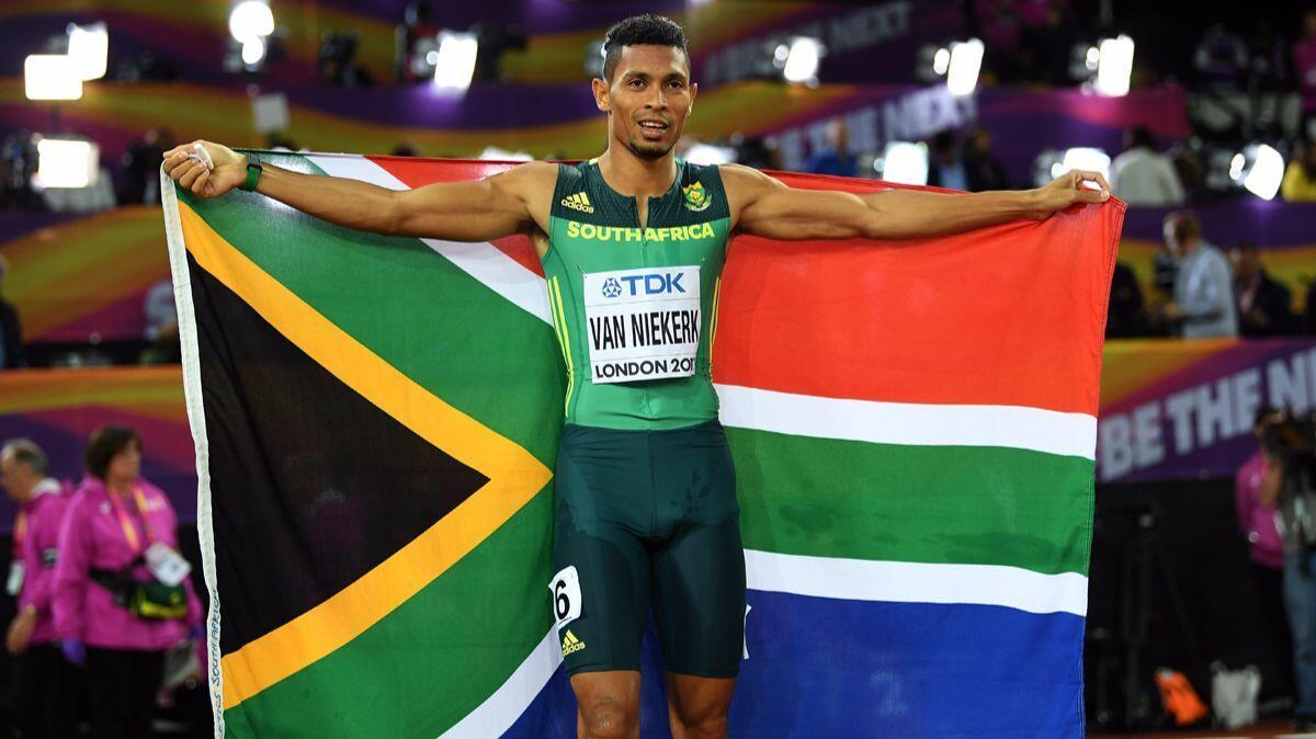 Wayde van Niekerk celebrates after winning the Men's 400 meters final at the 16th IAAF World Athletics Championships London 2017 on Tuesday.