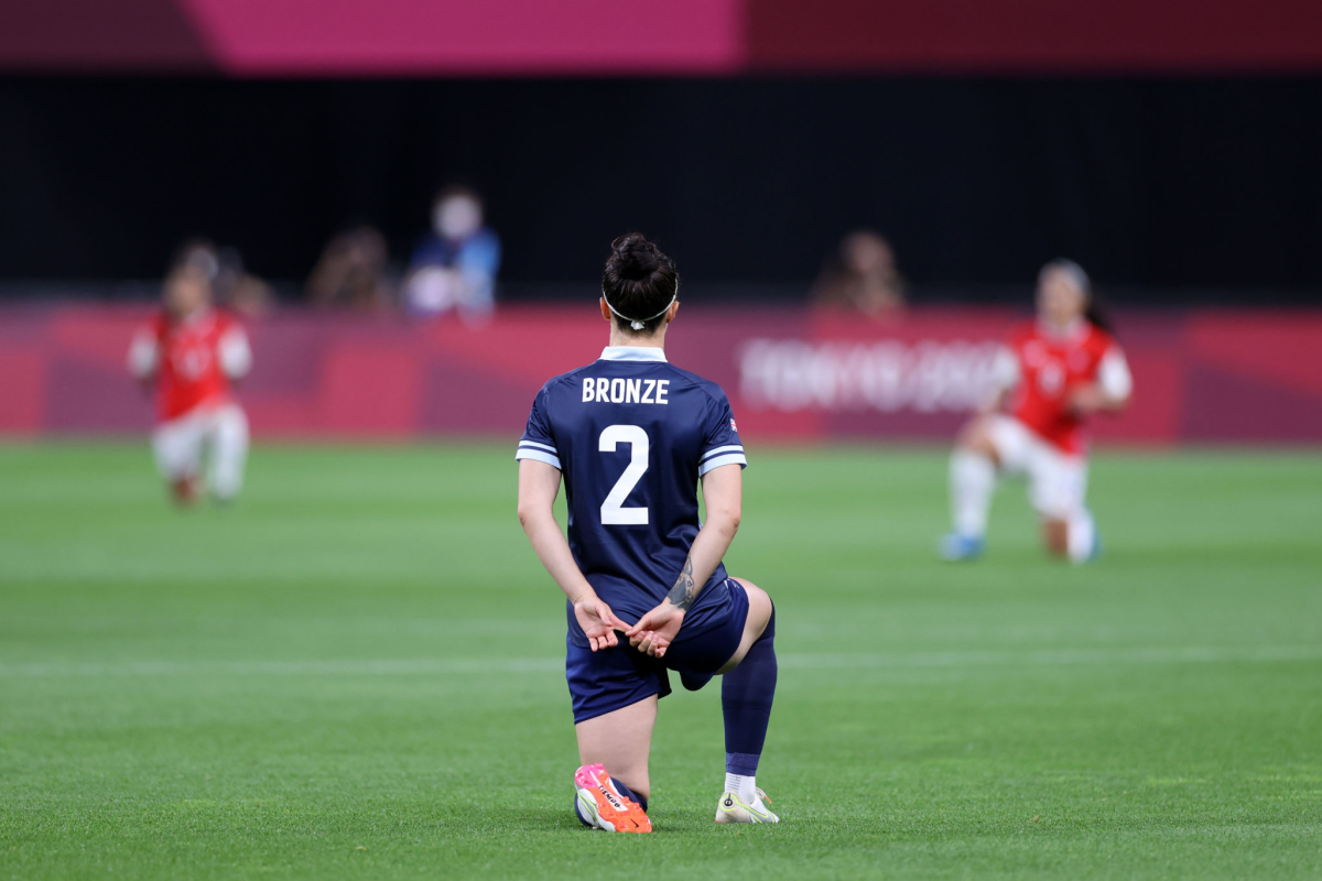 Britain's Lucy Bronze takes a knee in support of the Black Lives Matter movement before a match against Chile.