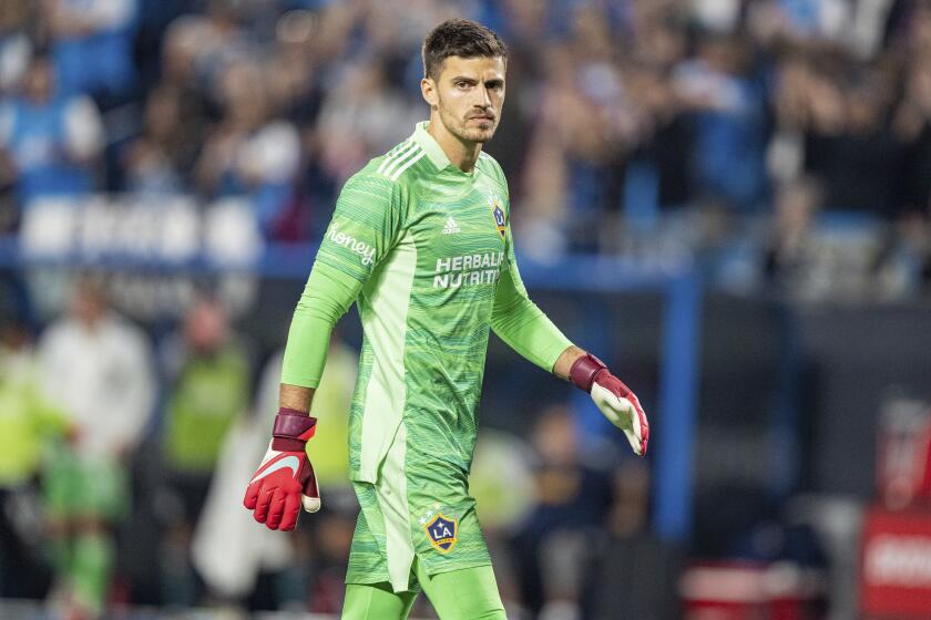 LA Galaxy goalkeeper Jonathan Bond (1) looks on during the second half of an MLS soccer match.