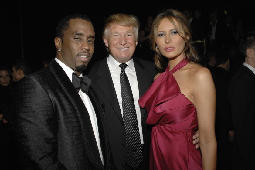 NEW YORK, NY - FEBRUARY 6: (L-R) Sean Combs, Donald Trump and Melania Trump attend GUCCI and MADONNA host A NIGHT TO BENEFIT RAISING MALAWI AND UNICEF at the United Nations on February 6, 2008 in New York City. (Photo by JOE SCHILDHORN/Patrick McMullan via Getty Images)