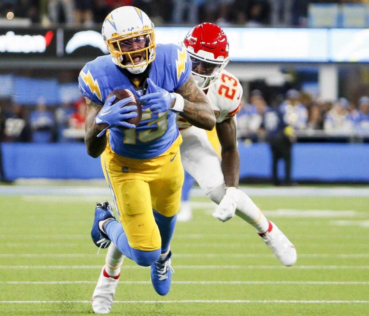Chargers wide receiver Keenan Allen catches a pass in front of Kansas City Chiefs cornerback Joshua Williams.