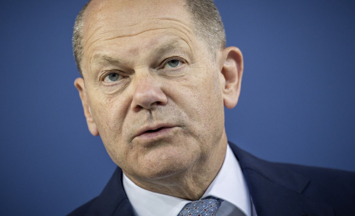 Chancellor Olaf Scholz attends the press conference after the Conference of Minister Presidents in Berlin, Thursday June 2, 2022. (Michael Kappeler/dpa via AP)