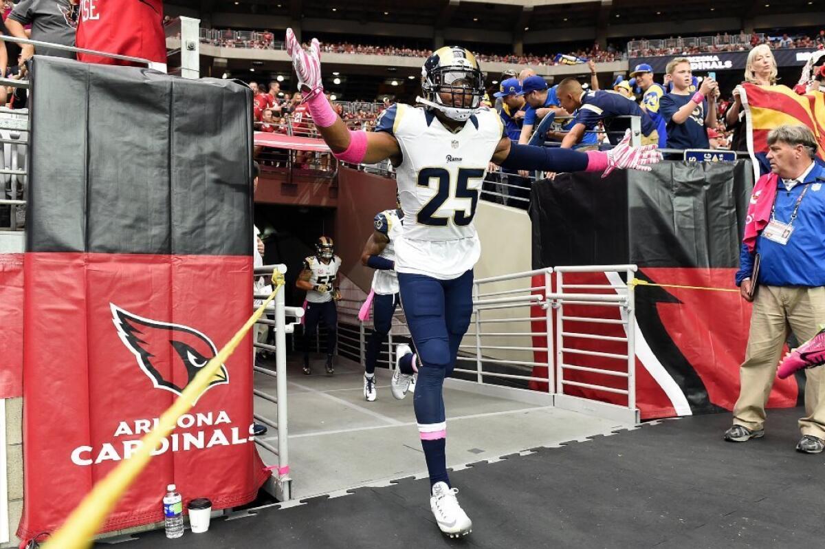 Rams safety T.J. McDonald runs on to the field before a game against the Cardinals on Oct. 4.