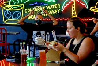 LOS ANGELES, CA - AUGUST 31: Lunch time crowd at Grand Central Market on Thursday, Aug. 31, 2023 in Los Angeles, CA. COVID-19 making a comeback in California. (Gary Coronado / Los Angeles Times)