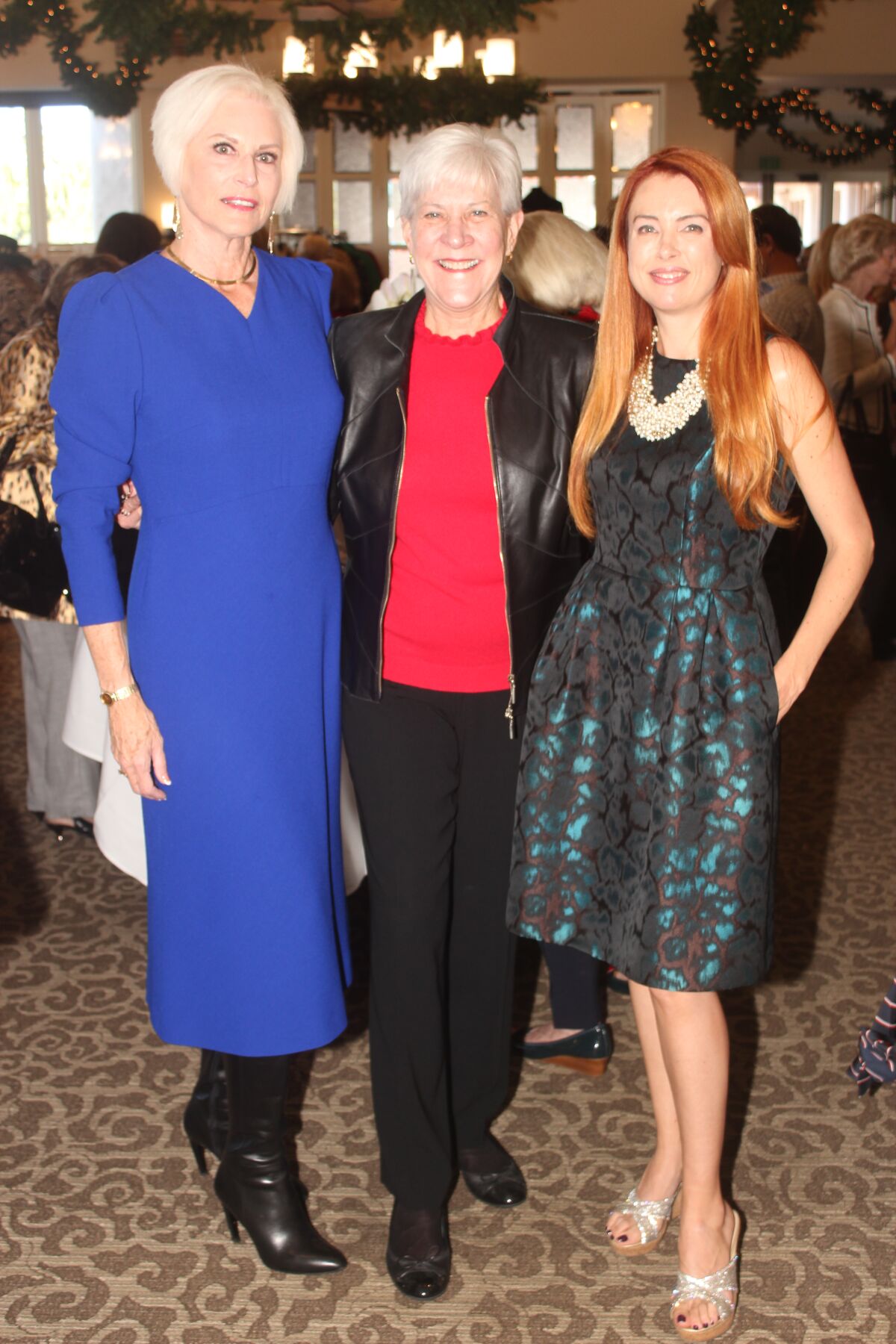 Suzanne Newman, The Country Friends president; Deborah Cross, first vice president, and Amber Yoo, past Art of Fashion chair.