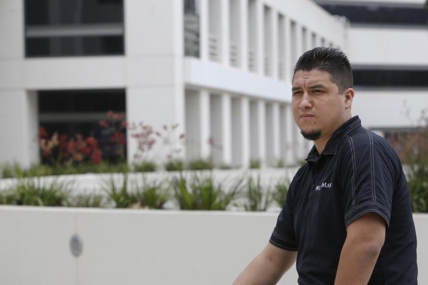 Jorge Villalba, shown in 2015 in front of the ITT Technical Institute in Encinco, left the school owing about $150,000 in student loans.