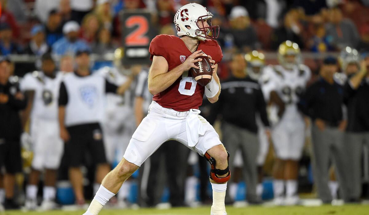 Stanford quarterback Kevin Hogan looks to throw a pass against UCLA in the third quarter on Thursday.