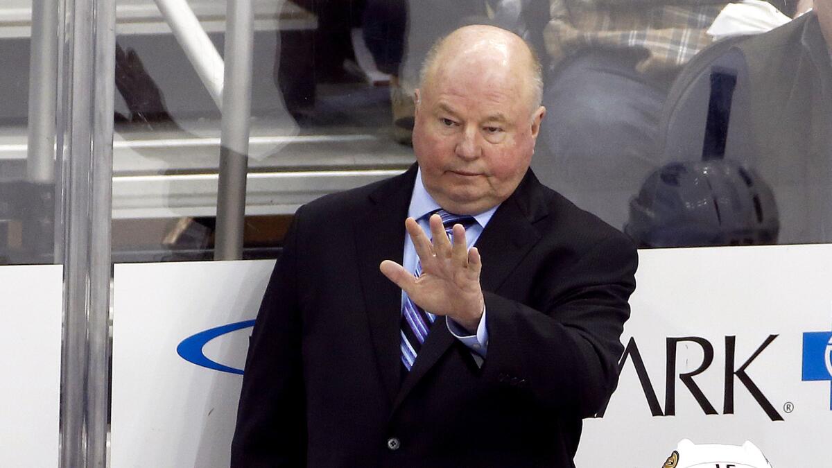 Bruce Boudreau gives some directions to the Ducks during a game this season in Pittsburgh.