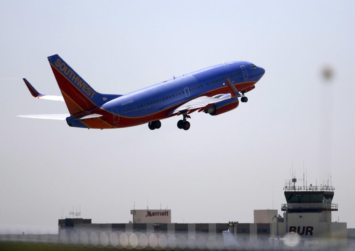 A Southwest Airlines plane takes off from Bob Hope Airport on Thursday, July 19, 2012.