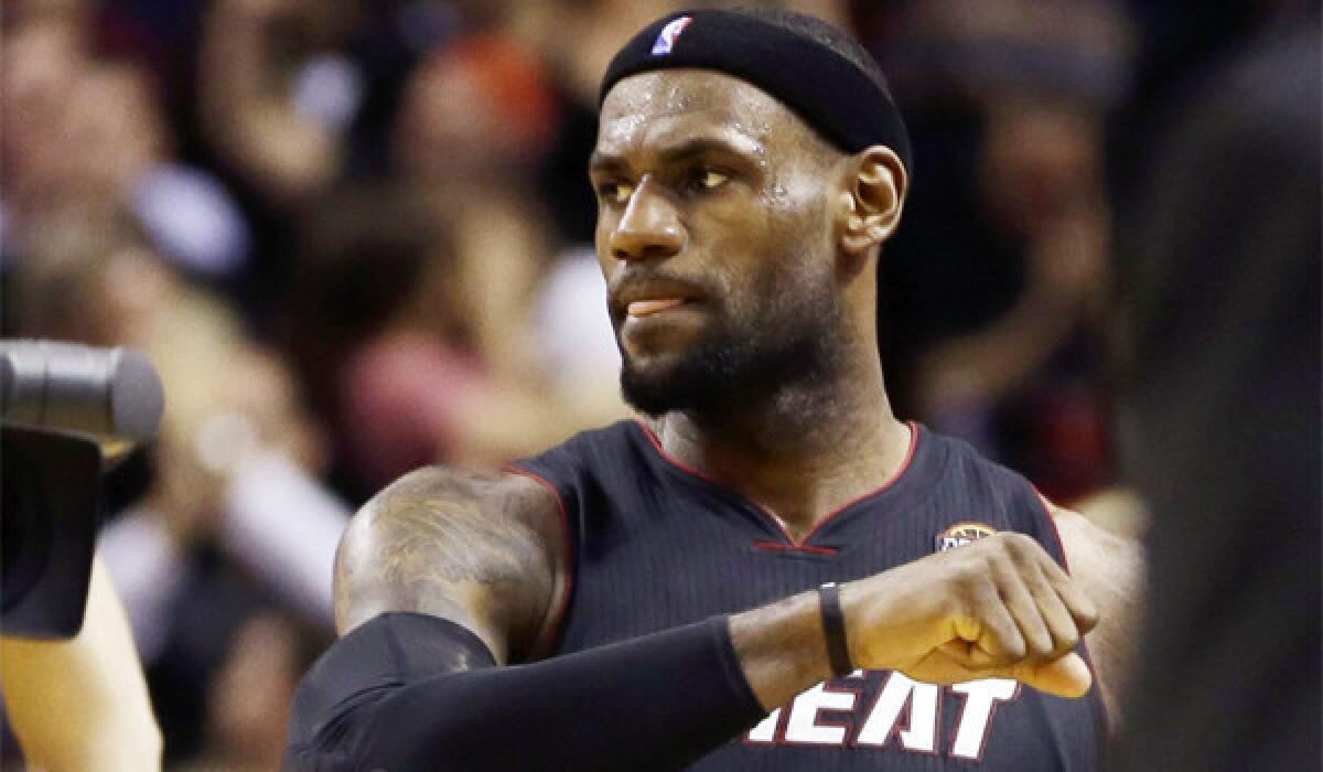 LeBron James and the Miami Heat maintain their hold on the top of The Times' rankings.