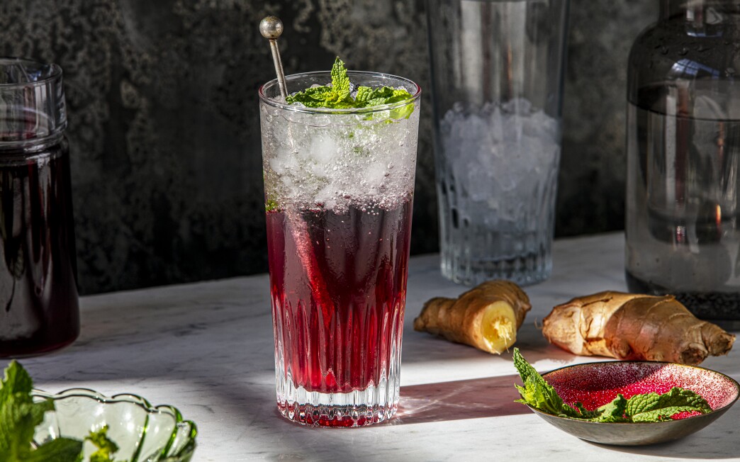 Hibiscus tea, fresh ginger and orange blossom water add fragrance to this bubbly drink.