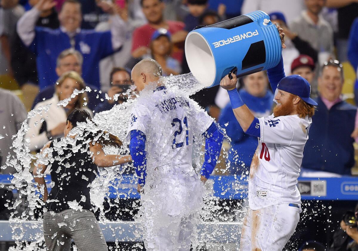 Dodgers third baseman Justin Turner douses outfielder Trayce Thompson after his game-winning home run against the Mets at Dodger Stadium on May 10.
