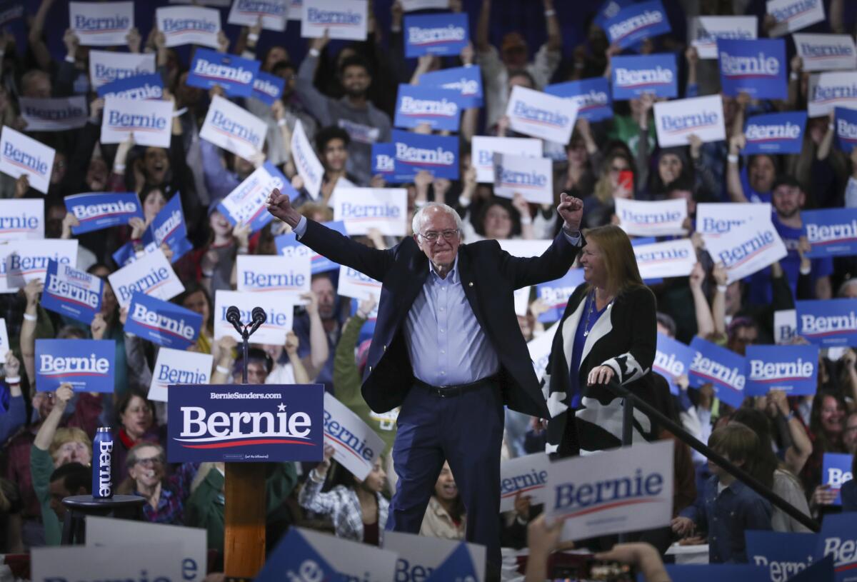 Democratic presidential candidate Sen. Bernie Sanders (I-Vt.) greets supporters at a Super Tuesday rally in Essex Junction, Vt.