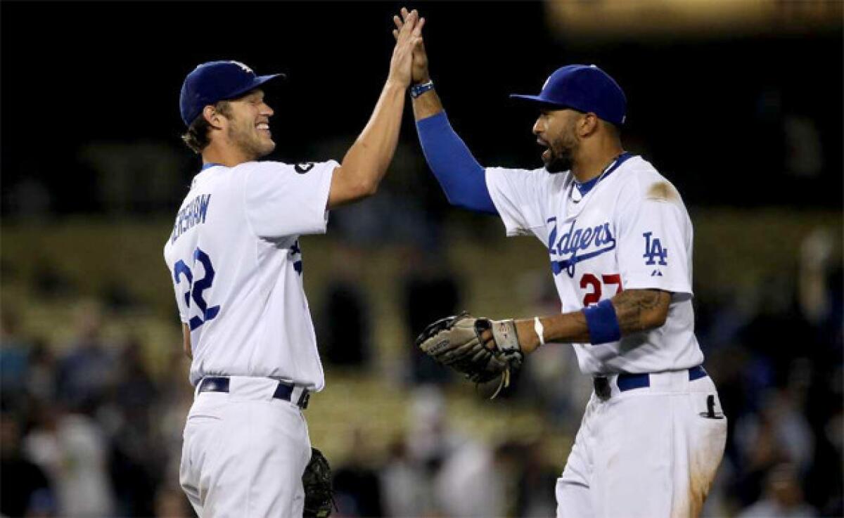 Clayton Kershaw, left, and Matt Kemp of the Dodgers, who will put individual tickets on sale Jan. 26 at 10 a.m.