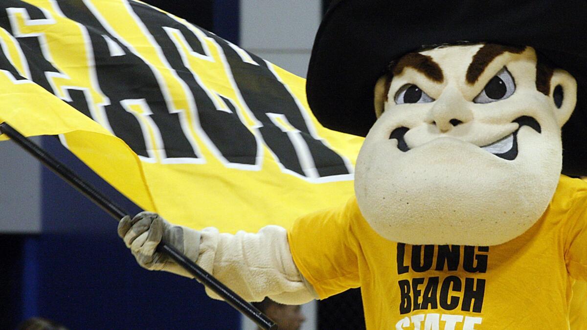 Cal State Long Beach mascot Prospector Pete fires up the crowd before a game at the Pyramid in 2011.