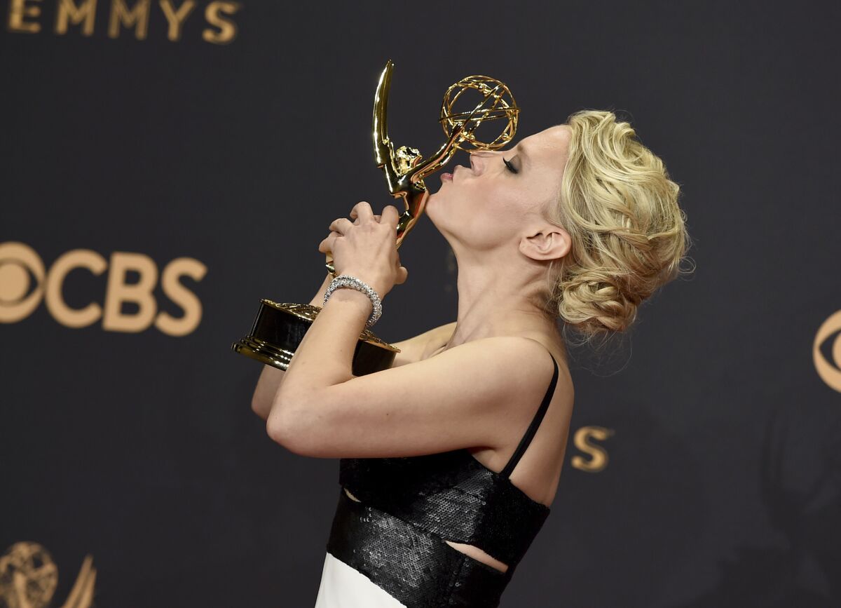 Kate McKinnon with her award for supporting actress in a comedy series for "Saturday Night Live."
