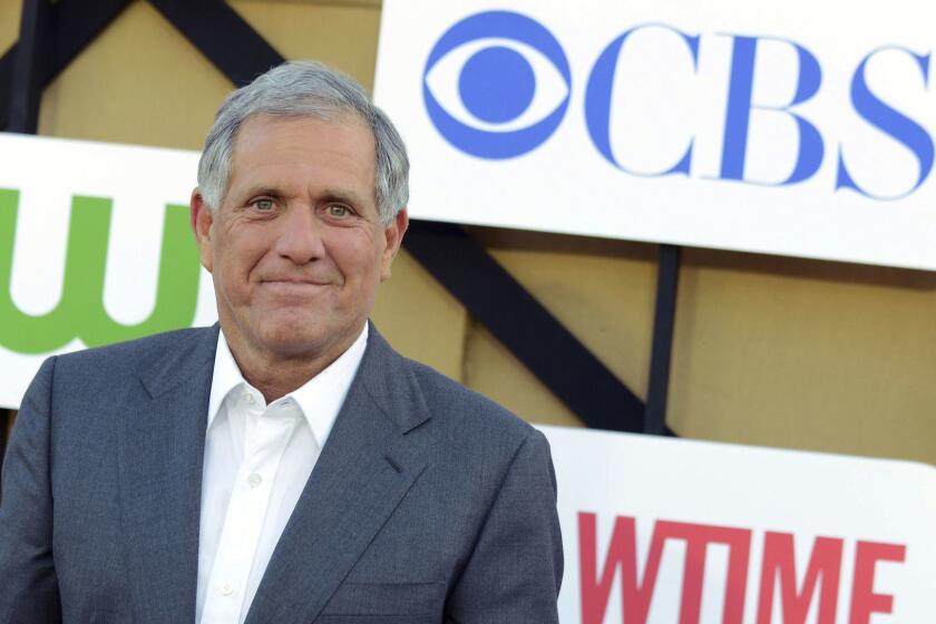 FILE - In this July 29, 2013 file photo, Les Moonves arrives at the CBS, CW and Showtime TCA party at The Beverly Hilton in Beverly Hills, Calif. The CBS board said Friday, July 27, 2018, it was investigating allegations of personal misconduct involving Moonves. (Photo by Jordan Strauss/Invision/AP, File)