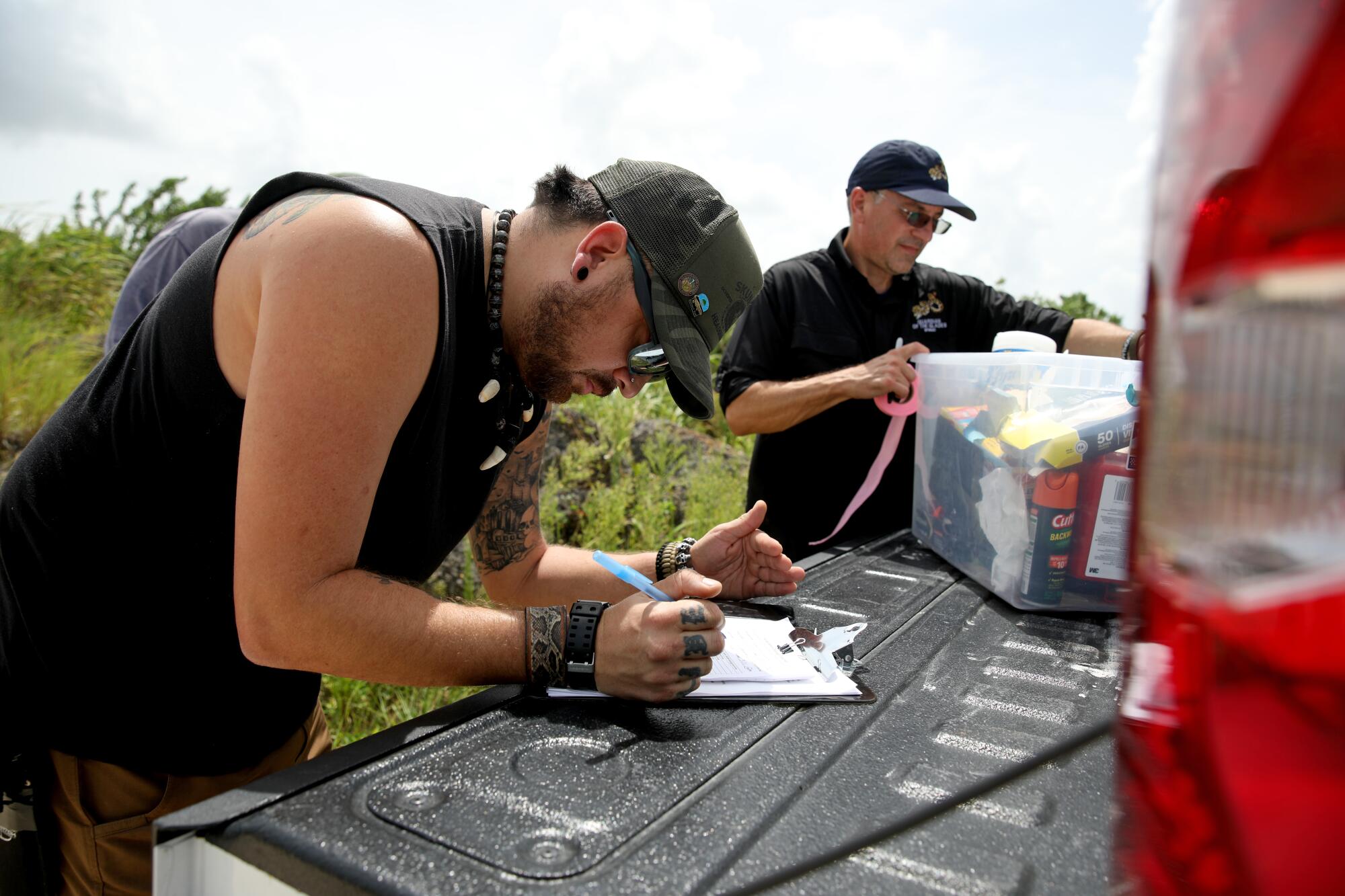 Ronnie Rodriguez, left, competes in his third Python Challenge.