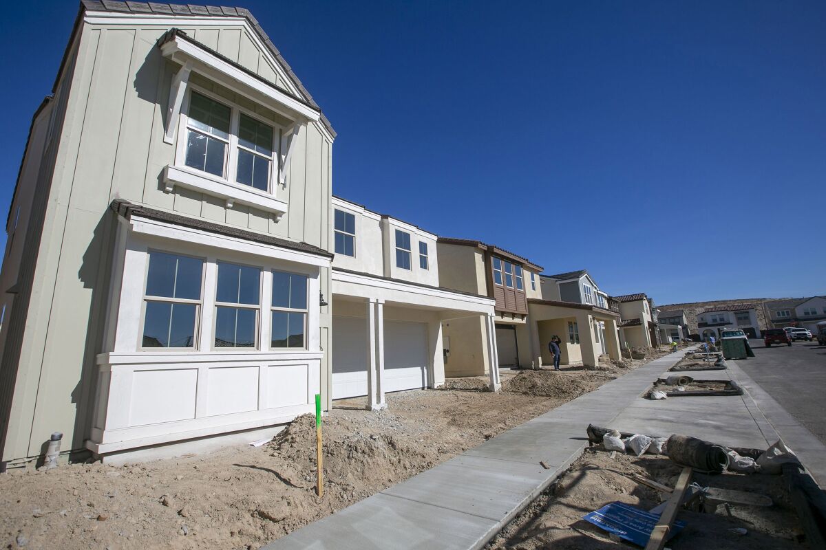 Newly completed single family homes getting finishing touches in the Seville project in Chula Vista on Friday, January 31, 2020.