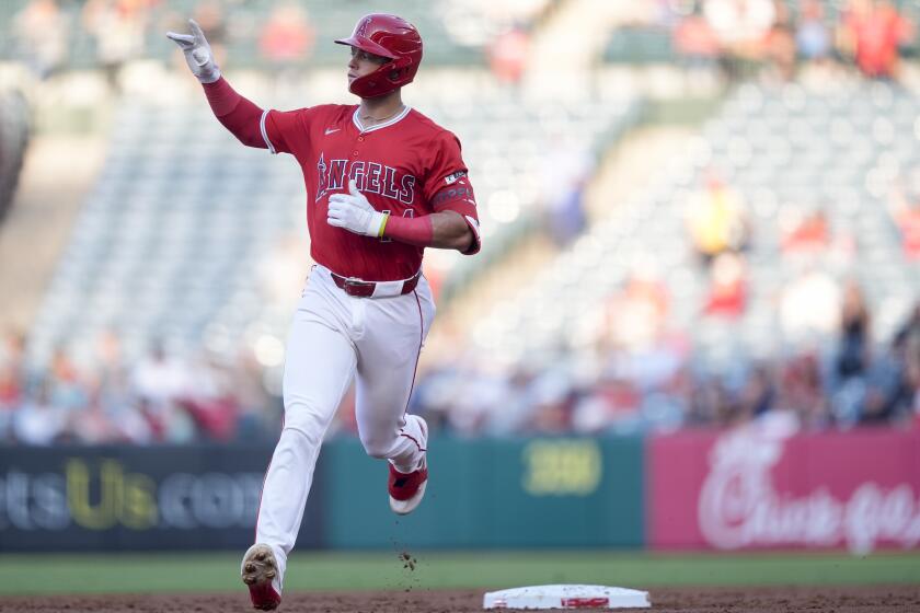 Los Angeles Angels' Logan O'Hoppe celebrates his solo home run during the second inning of a baseball game against the Texas Rangers, Tuesday, July 9, 2024, in Anaheim, Calif. (AP Photo/Ryan Sun)