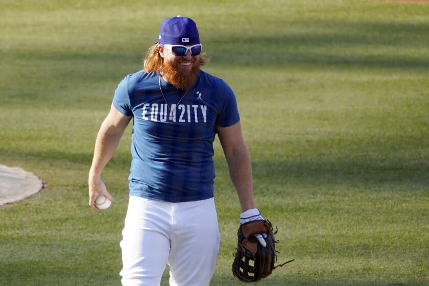 Los Angeles Dodgers' Justin Turner smiles during a workout, Tuesday, Sept. 29, 2020, at Dodger Stadium.