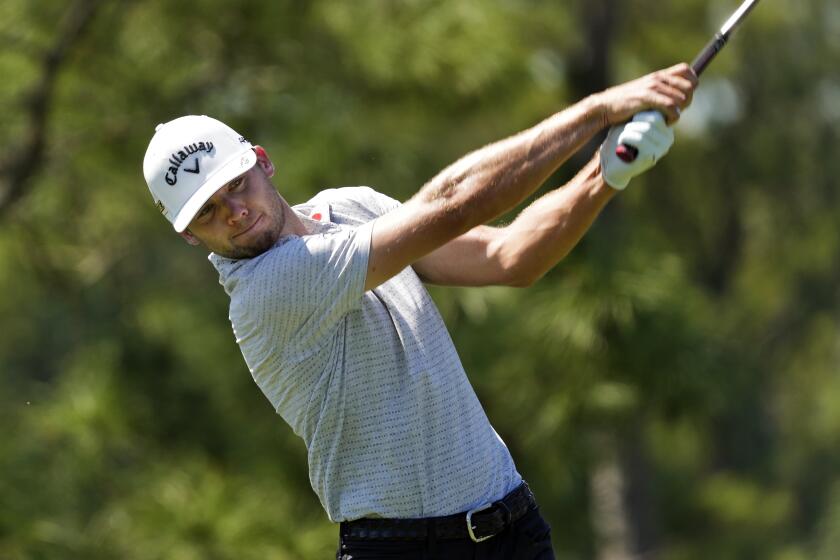 Sam Burns tees off on the sixth hole during the second round of the Valspar Championship golf tournament, Friday, March 18, 2022, at Innisbrook in Palm Harbor, Fla. (AP Photo/Chris O'Meara)