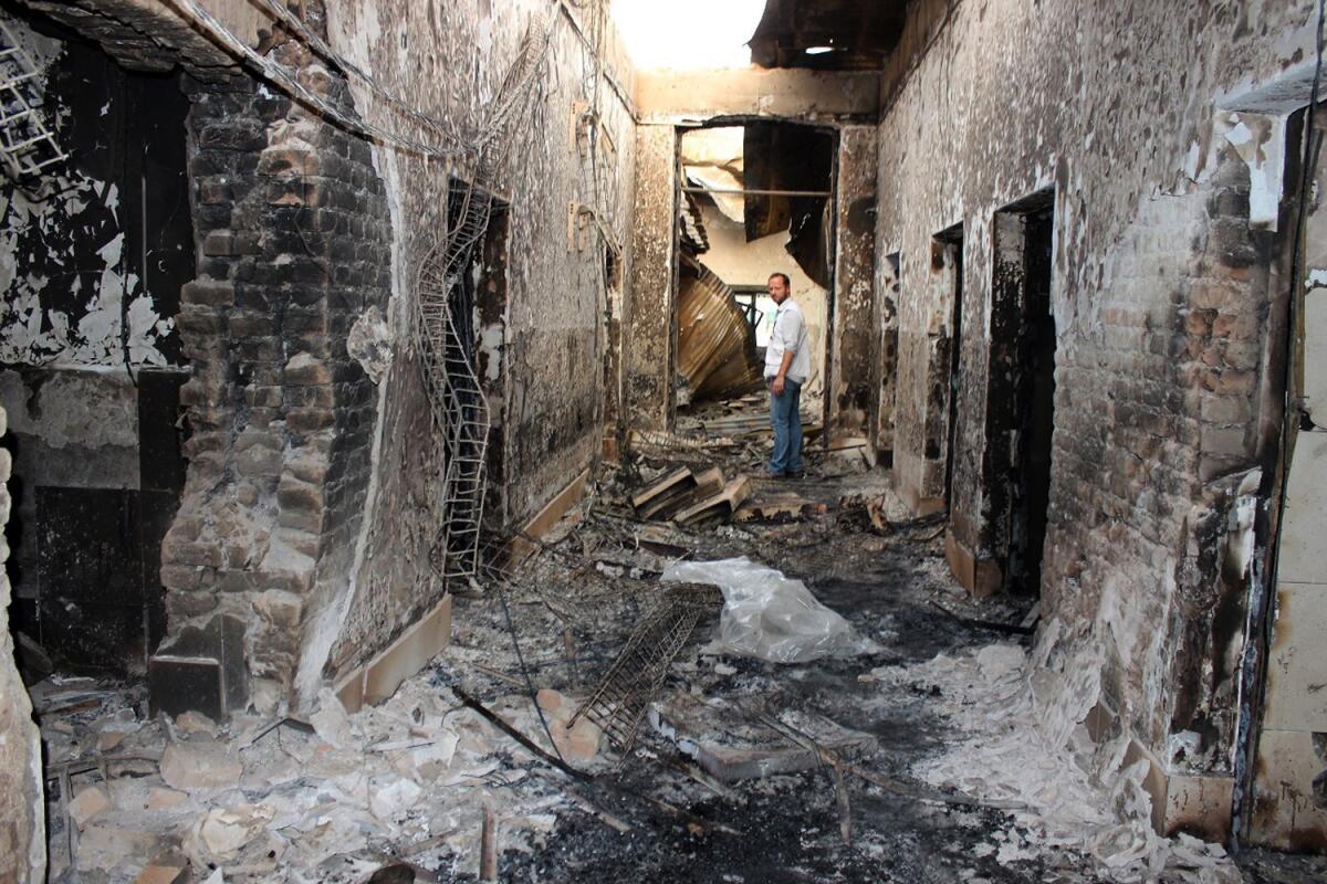 An employee of Doctors Without Borders in the charred ruins of the charity's hospital in Kunduz, Afghanistan, hit by U.S. airstrikes Oct. 3.